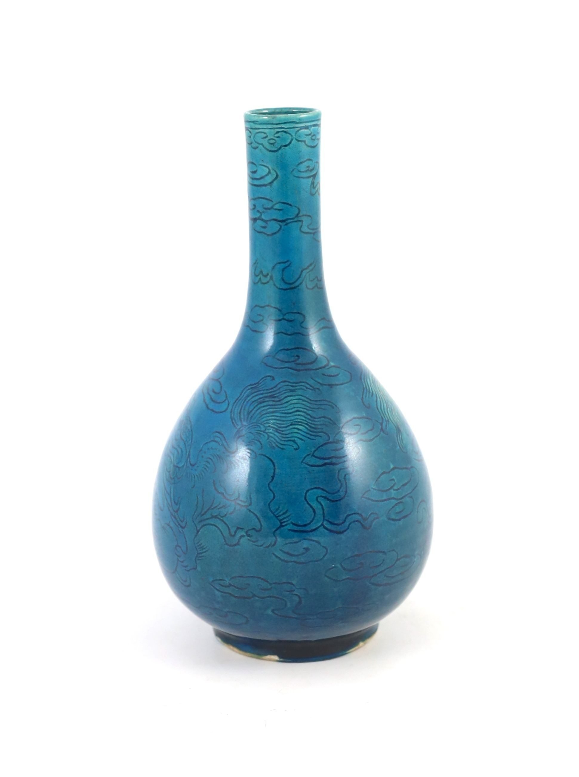 A Chinese turquoise glazed sgraffito bottle vase, 19th century, 21 cm high